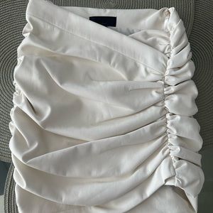 Revolve torin mini skirt in optic white- micheal costello